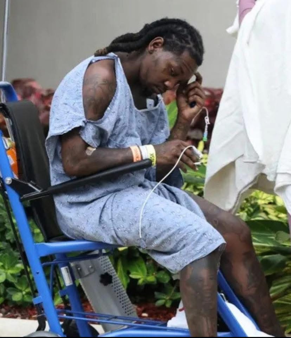 First Glimpse,Offset Seen in Wheelchair Outside Hospital After Florida Shooting Incident